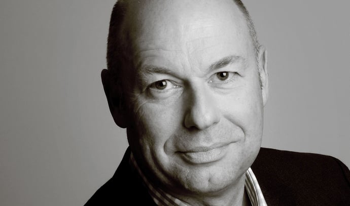 black and white photo of Tim Hughes